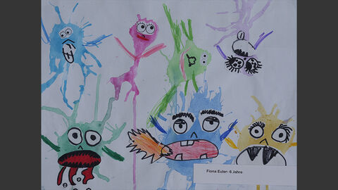 Bunte Gesichter, aus Farbklecksen geformt