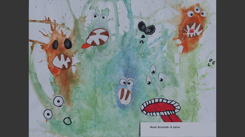 Bunte Gesichter, aus Farbklecksen geformt