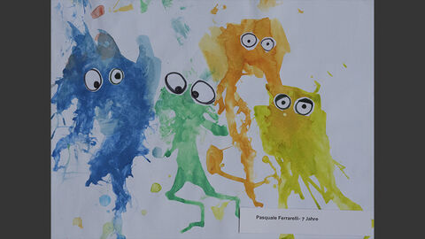Bunte Gesichter, aus Farbklecksen geformt