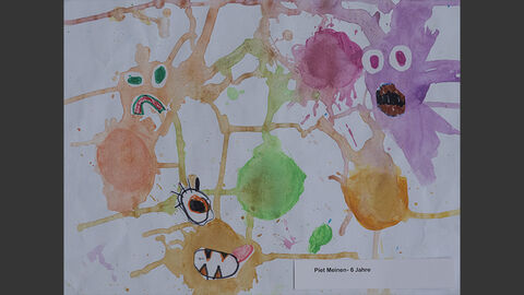 Bunte Gesichter, aus Farbklecksen geformt