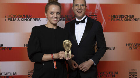 Staatssekretär Degen mit Preisträgerin